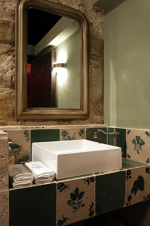 Bathroom with 18th century tiling